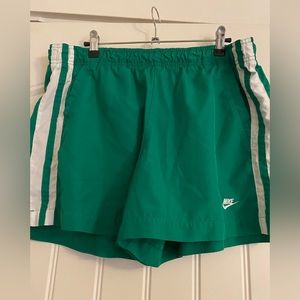 green nike shorts
